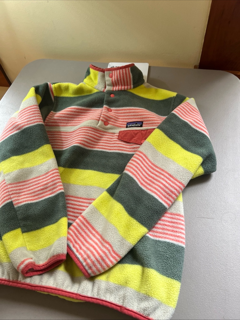 Patagonia woman’s  Striped Fleece button Up in Green, Pink, Yellow, Cream